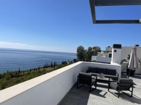 Sunny penthouse beach apartment with panoramic views